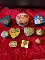 Group shot of all ten boxes showing variety of shapes, materials and designs