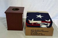 Urn beside folded flag on C.F. Flag box