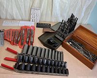 overall view of sockets, drill bits, gauge cards