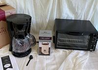 Coffee maker, boxed grinder, toaster oven, scoop and manual