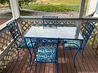 full patio set showing table and chairs