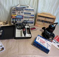 Alltrade accessory kit, Weller rotary tool in case, Ryobi bit set, Rockwell router, clamp box