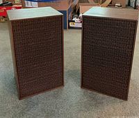 Front view of both Dynaco speakers showing grills and cabinets