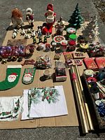 Full lot overview on cardboard showing all Christmas items