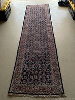 Full-length top-down view of runner on light floor