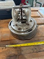 Top view of rotating beacon with dual bulbs in metal housing