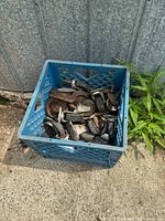 Top view of crate filled with assorted casters and wheels
