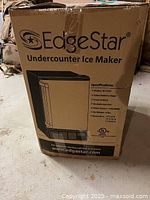 Cardboard shipping box labeled EdgeStar Undercounter Ice Maker, model IB120SS