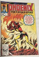 Front cover of the Marvel comic book 'Phoenix The Untold Story' issue 1, April. Shows the main character Phoenix with flames and rocky background, priced at $2.00.