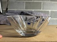 Crystal bowl with label visible and faceted geometric cut design