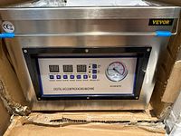 Front view showing digital control panel with LED displays, vacuum meter and VEVOR logo