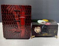 Both wooden items shown side by side: Kamakura carved drawer unit on left, floral painted jewelry box on right.