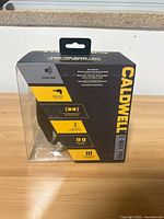 Front of sealed box showing brand, model, key features