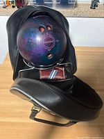 Bowling ball in bag showing overall lot