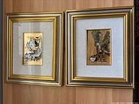 Both framed artworks side by side showing full view
