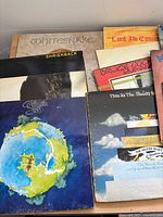 Stack of LPs showing Whitesnake, Shriekback, Yes Fragile, Moody Blues albums