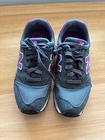 Top view of both shoes showing laces, logo, and overall wear