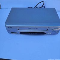 Front view of the Citizen VCR showing VHS tape slot, control buttons, and brand logo.