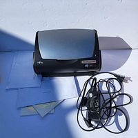 Top view of Fujitsu ScanSnap scanner with power adapter and cables included in lot