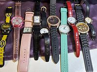 All 10 watches laid out side by side
