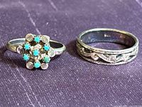 Both sterling rings side by side showing designs and stones