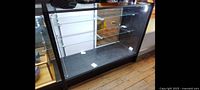 Front view of glass display cabinet empty