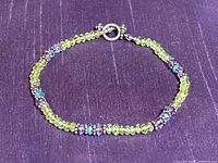 Full view of bracelet showing bead pattern and clasp