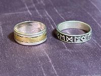 Both sterling silver rings side by side