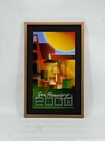 Framed print titled 'San Francisco 2000' showing full artwork with abstract geometric shapes and partial Golden Gate Bridge image.