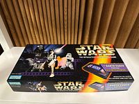 Front of the vintage Star Wars Interactive Video Board Game box showing iconic characters and logo.