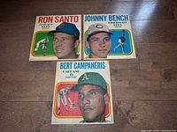 All three posters laid out together showing player names and portraits