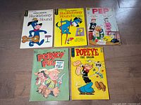 Group shot of all five vintage comics
