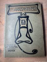 Front cover of khaki Schaubek Marken-Album