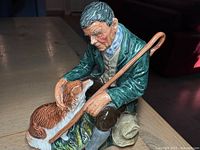 Front angle showing man, dog, crook, overall condition