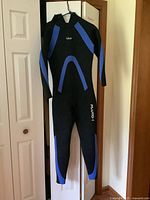 Full view of wetsuit hanging