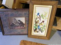 Both framed prints side by side