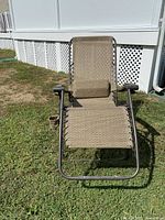 Recliner chair front view set upright on lawn