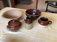 All five stoneware pieces displayed on table