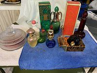 Group shot showing all bottles and powder bowl