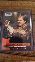 Front of Bill Belichick NFL Pro Set rookie card in sleeve