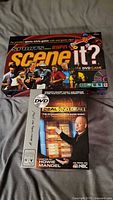 Both boxed games: Sports Scene It? and Deal or No Deal