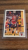 Front of Michael Jordan Upper Deck card in sleeve