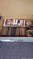 Open box showing stacks of 1991 Pro Set NFL trading cards