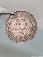 Reverse of 1914 Canada large cent showing maple wreath, denomination and date
