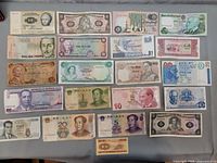Group shot of all nineteen banknotes laid out