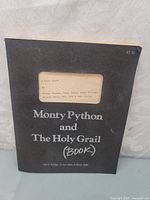 Front cover showing title, die-cut window and price