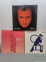 Front covers of all three records displayed