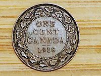 Reverse side showing denomination, country and date