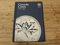 Front cover of blue Uni-Safe Canada Cents album
