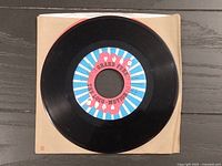 A-side of the record in plain sleeve